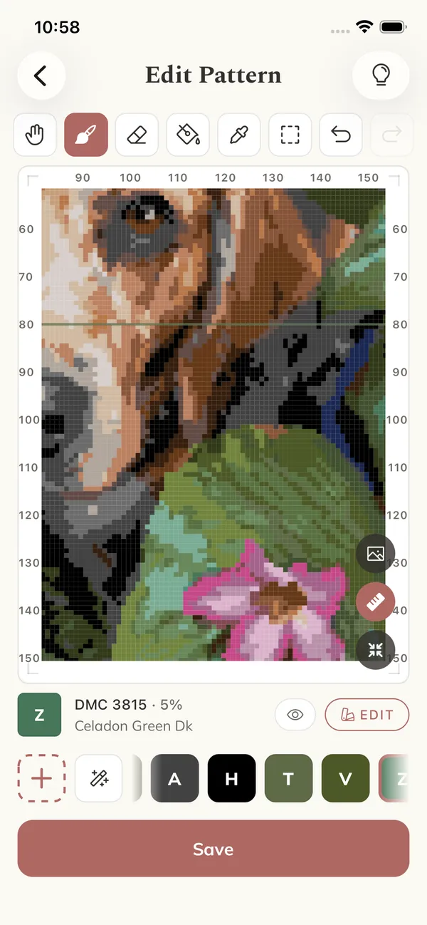 A photo converted into a cross stitch chart with a DMC color key